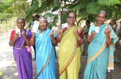 PORT BLAIR, APR 19 (UNI):- Voters showing mark of indelible ink after casting their votes at a polling booth during the 1st Phase of General Elections-2024 at Van Vikas Bhawan Haddo, Port Blair, in Andaman and Nicobar Islands on Friday. UNI PHOTO-272U