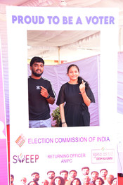 PORT BLAIR, APR 19 (UNI):- Voters showing a mark of indelible ink after casting their votes at a polling booth during the 1st Phase of General Elections-2024 at Jawaharlal Nehru Rajkeeya Mahavidyalaya Port Blair, in Andaman and Nicobar Islands on Friday. UNI PHOTO-294U