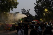 NEW DELHI, NOV 9 (UNI):- An anti-smog gun passes detained protesters in buses during a demonstration, where activists rally against government inaction over hazardous air quality at India Gate on Sunday. UNI PHOTO-RITIK SHARMA 19U NEW DELHI, NOV 9 (UNI):- An anti-smog gun passes detained protesters in buses during a demonstration, where activists rally against government inaction over hazardous air quality at India Gate on Sunday. UNI PHOTO-RITIK SHARMA 19U