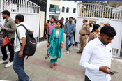LUCKNOW,MARCH 14,(UNI):- Candidates coming out from the Examination centre after appearing in the Sub-Inspector (SI) recruitment written examination conducted by the Uttar Pradesh Police Recruitment and Promotion Board (UPPRPB) at National PG College Hazratganj in Lucknow on Saturday.  UNI PHOTO: Sumit Kumar - U 86