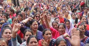 DEHRADUN,MAR 14 (UNI):-Aanganwadi workers from various areas of Uttarakhand protest at a police barricade near the Chief Minister’s residence in Dehradun on Saturday.UNI PHOTO-119U