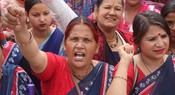 DEHRADUN,MAR 14 (UNI):-Aanganwadi workers from various areas of Uttarakhand protest at a police barricade near the Chief Minister’s residence in Dehradun on Saturday.UNI PHOTO-122U